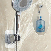 Shower head holder with adhesive