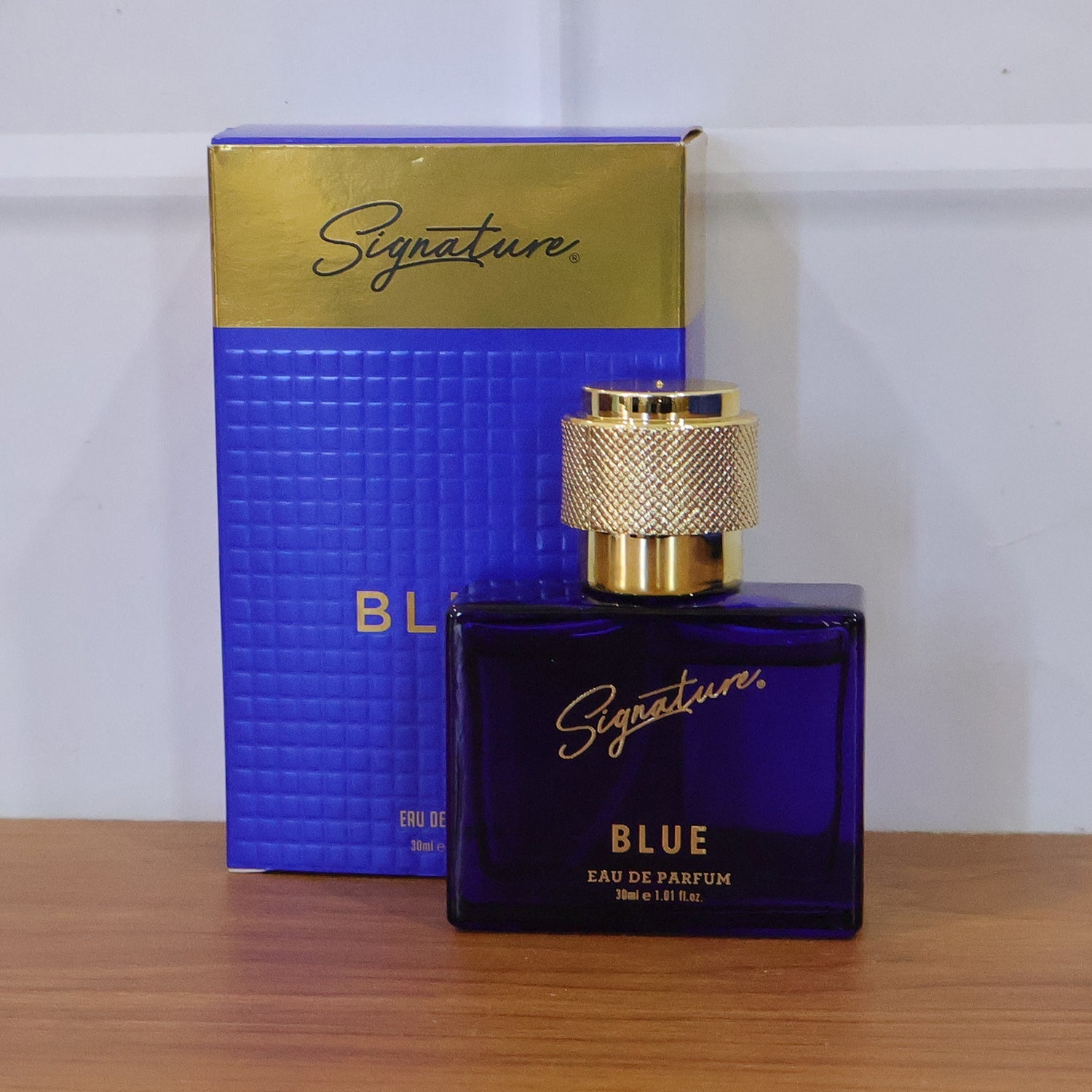 Signature blue perfume packaging design