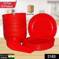 Set of soup bowls with accompanying spoons and saucers.