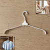 Foldable plastic clothes hanger