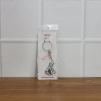 Premium Silver-Finish Metal Bal Krishna Eating Makhan Keychain (1 Pc)