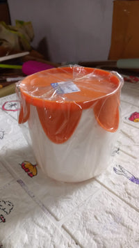 Plaid-patterned tissue box for home use with skid resistance.