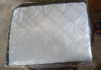 Aluminum foil cover for small air conditioners, protects from dust and weather.