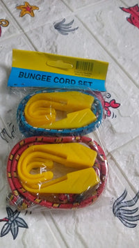 Close-up of strong plastic J shape hooks attached to bungee cord.